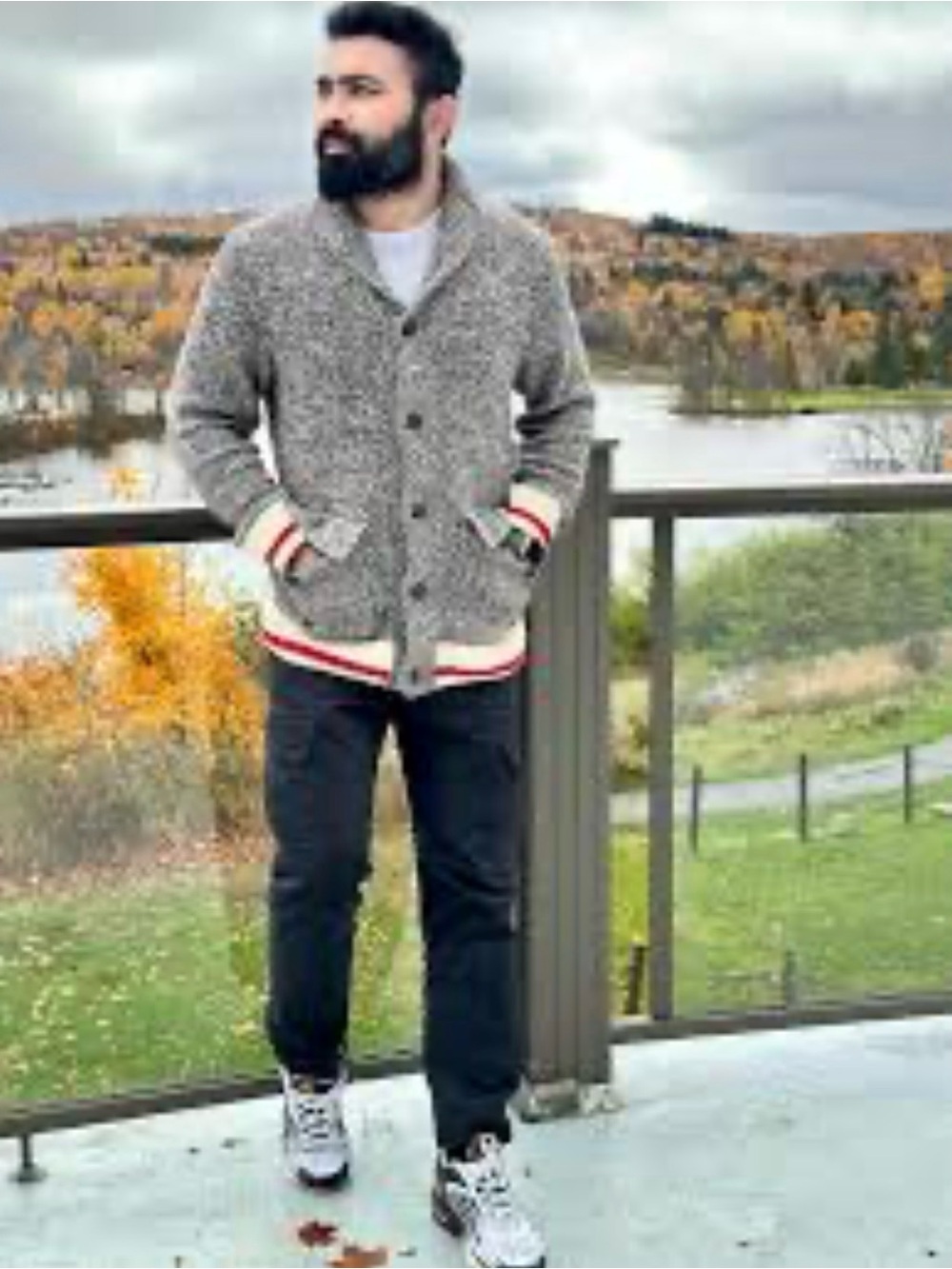 Roots Cabin Cardigan featuring a shawl collar and striped ribbed hem. Size large